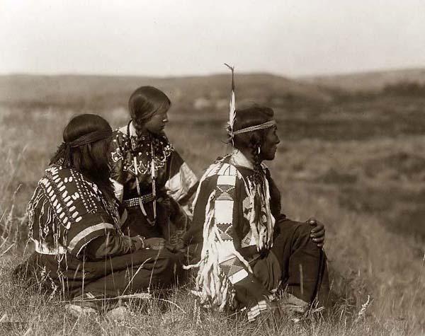 Indians Sitting in Grass